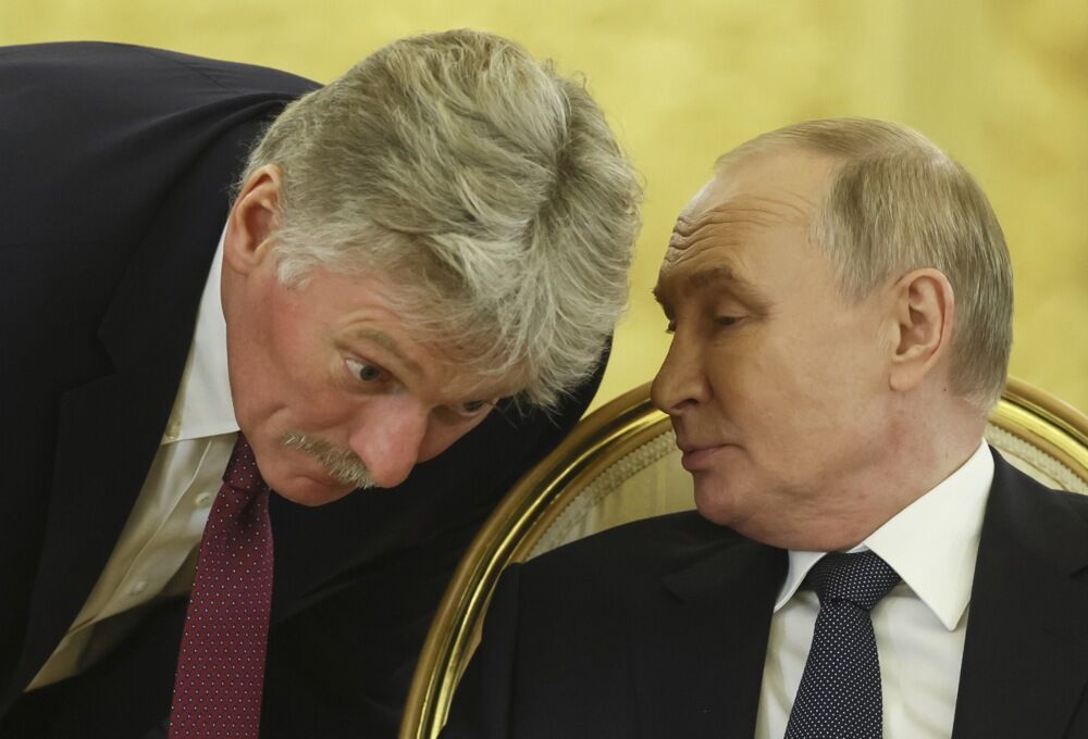 Dmitrij Peskov i Vladimir Putin
